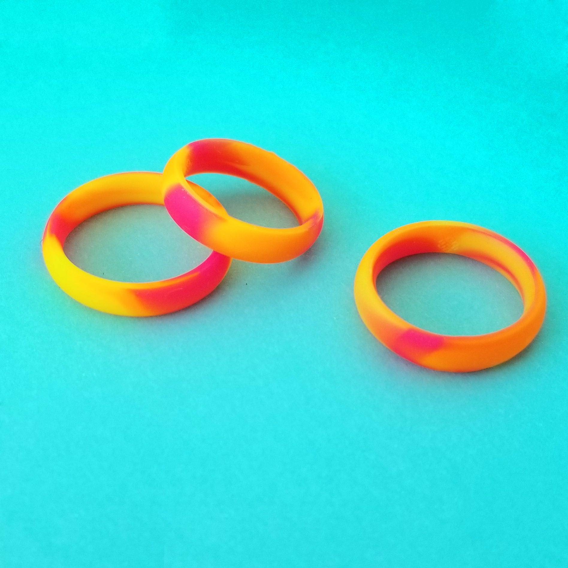 Neon Orange Yellow Pink Swirl Breathable Silicone Ring - Knot Theory